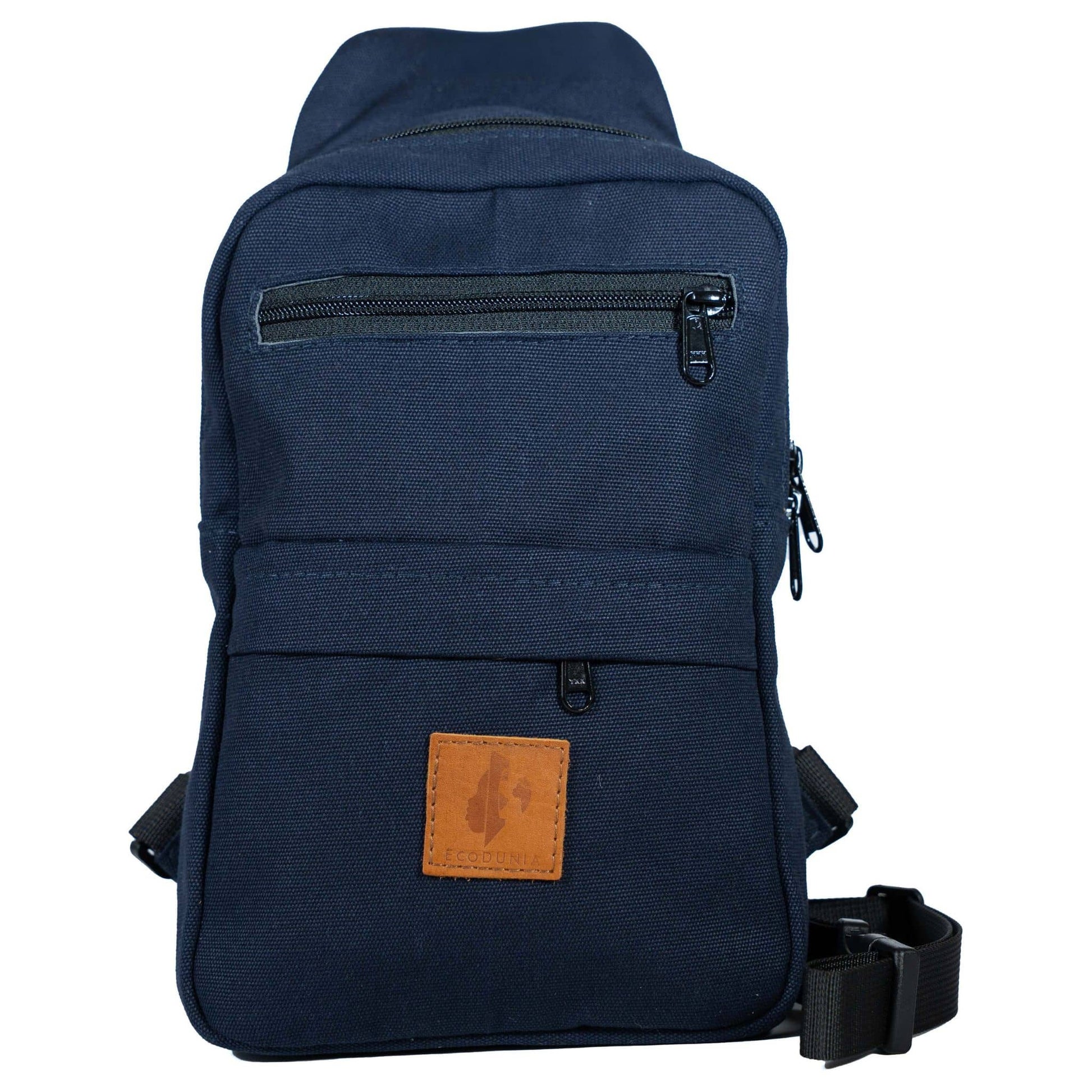 Umoja navy blue canvas sling bag flat lay #color_navy-blue