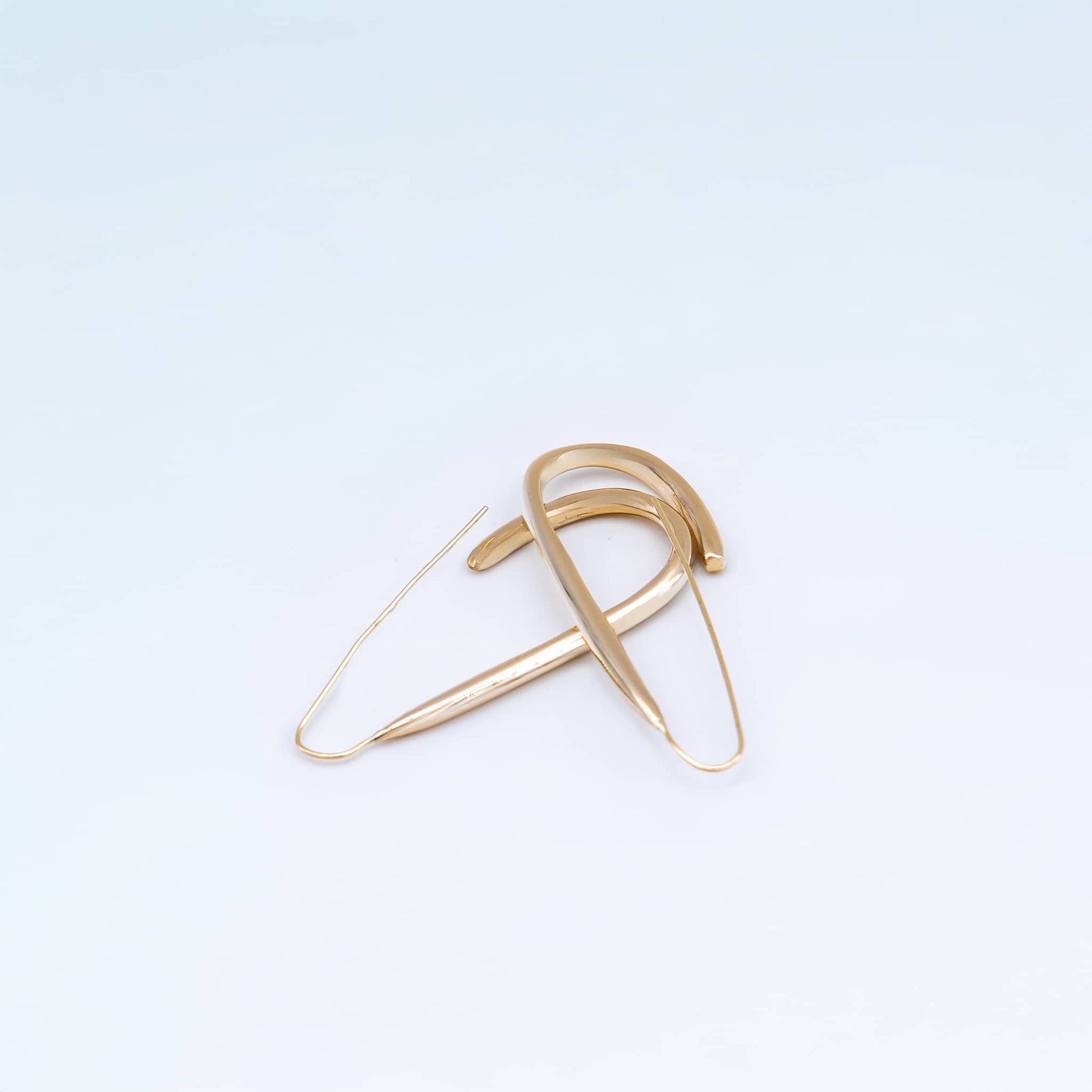 Ona U-shaped open brass hoop earrings flat lay — Ecodunia