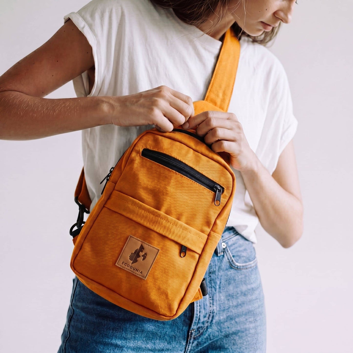 Umoja orange canvas crossbody sling bag #color_orange