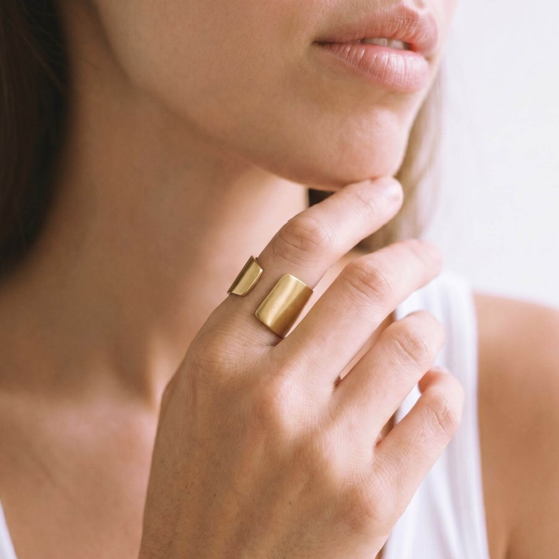 Penda wide band brass cuff ring flat lay — Ecodunia