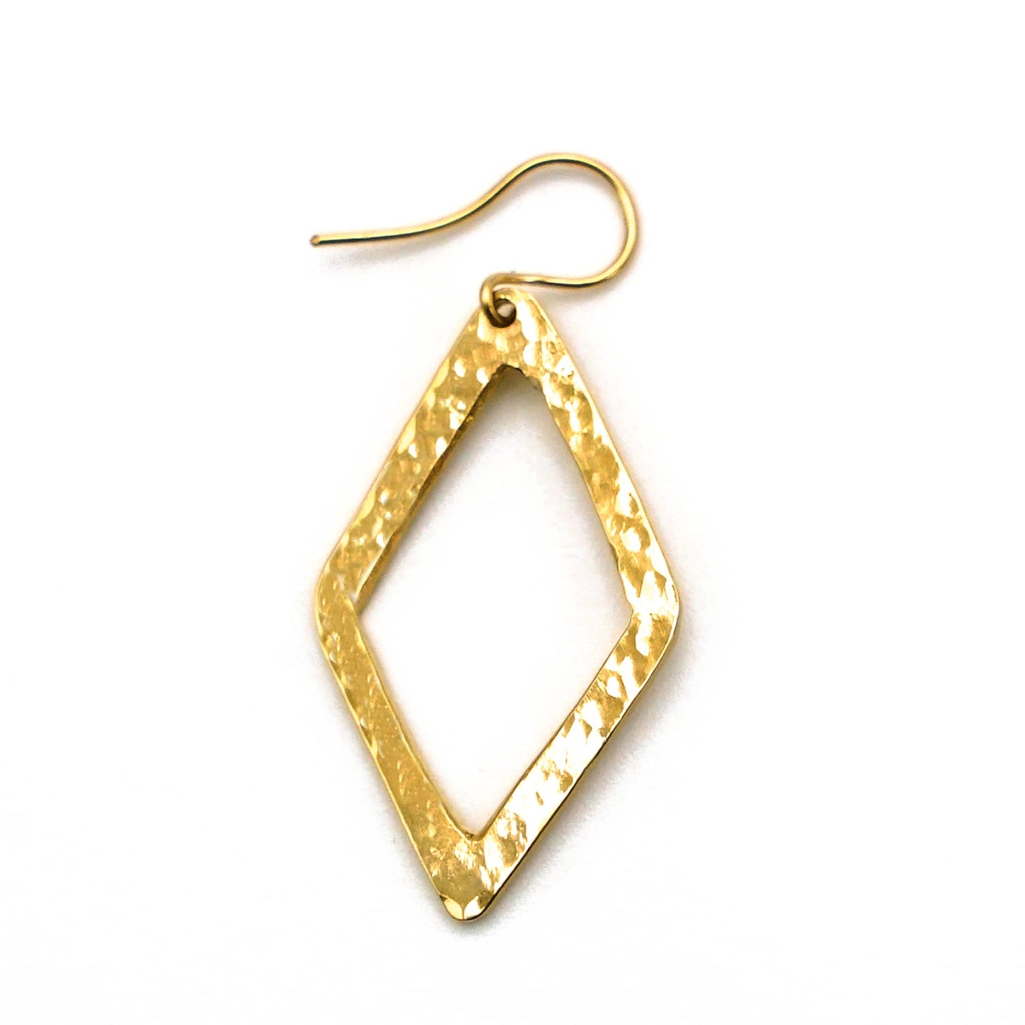 Wazi hammered geometric brass hoop earrings worn showing shape