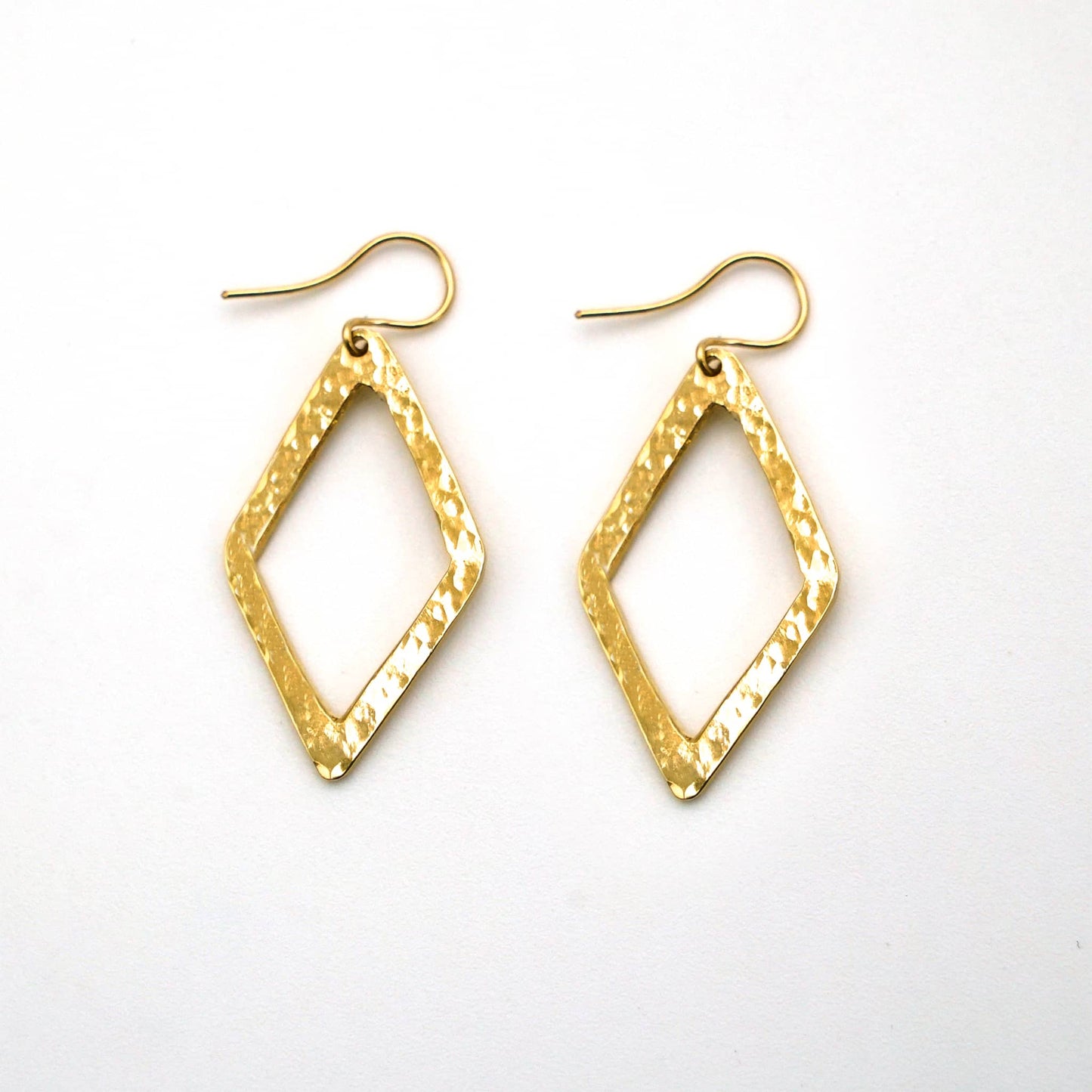 Wazi hammered open diamond brass earrings flat lay — Ecodunia