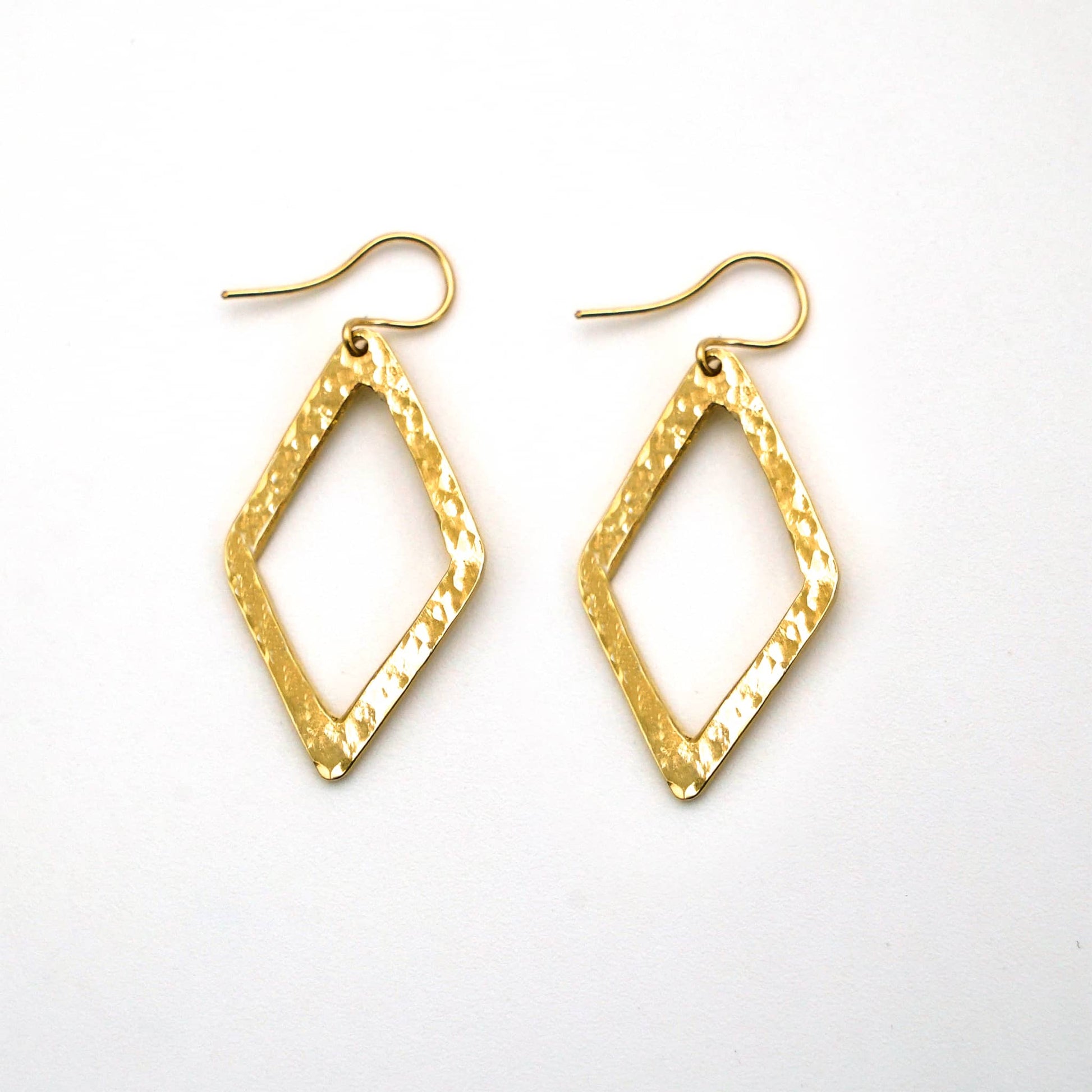Wazi hammered open diamond brass earrings flat lay — Ecodunia