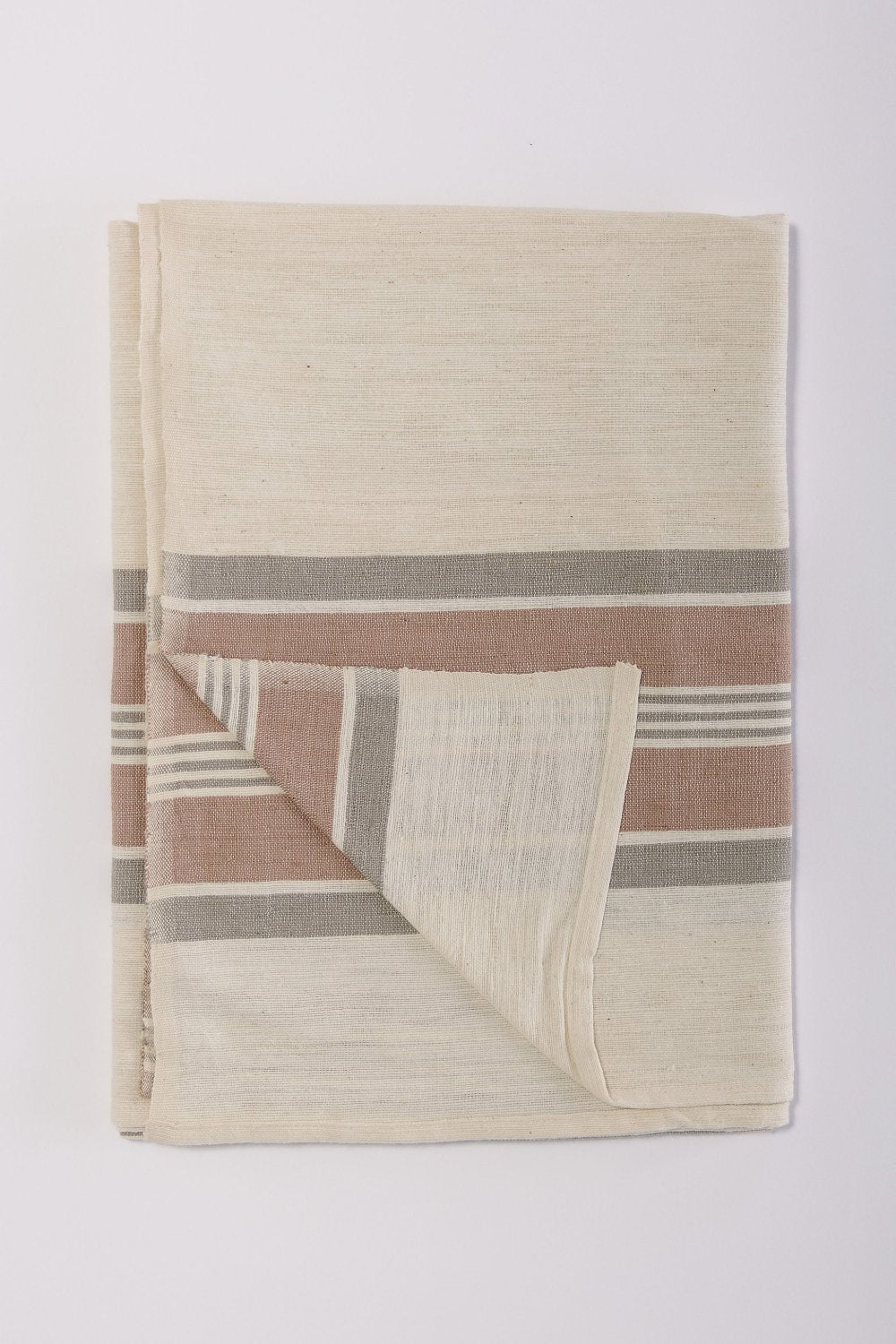 Weyra towel clay and stone flat lay