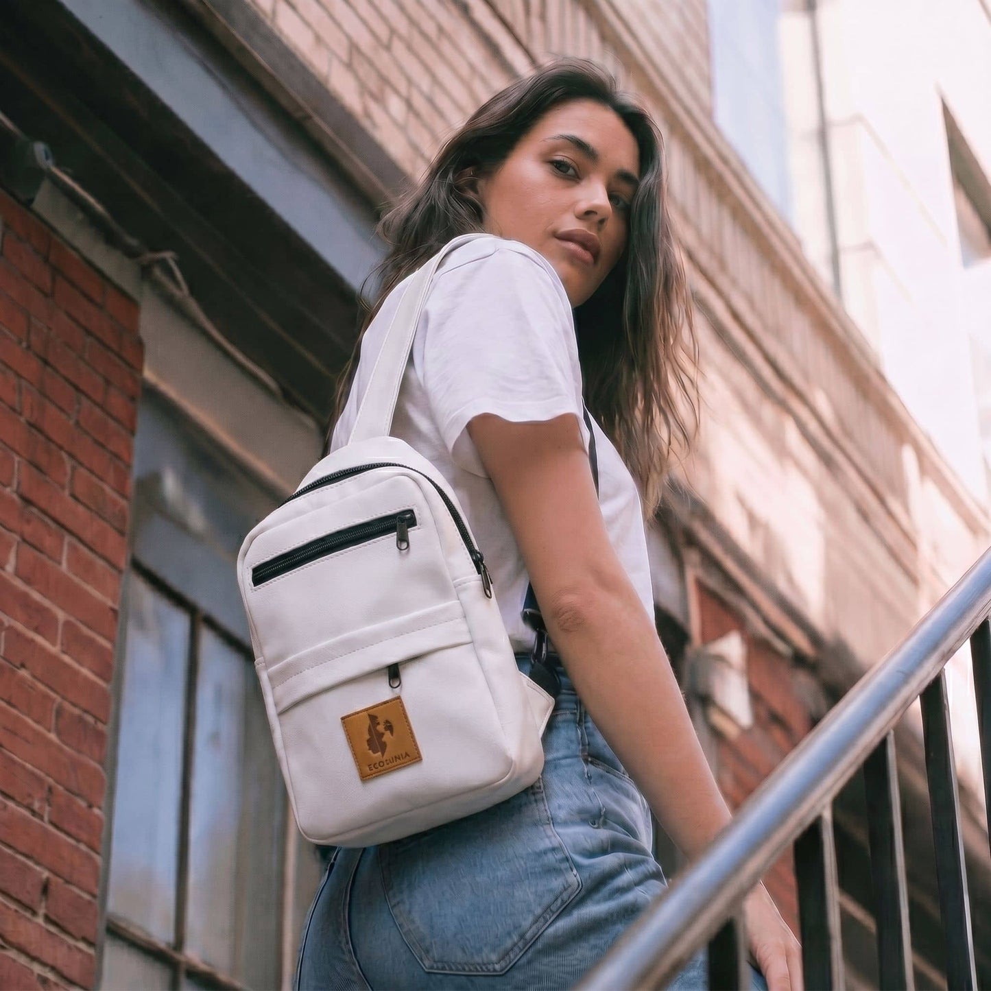 Umoja white vegan leather large sling bag travel #color_white