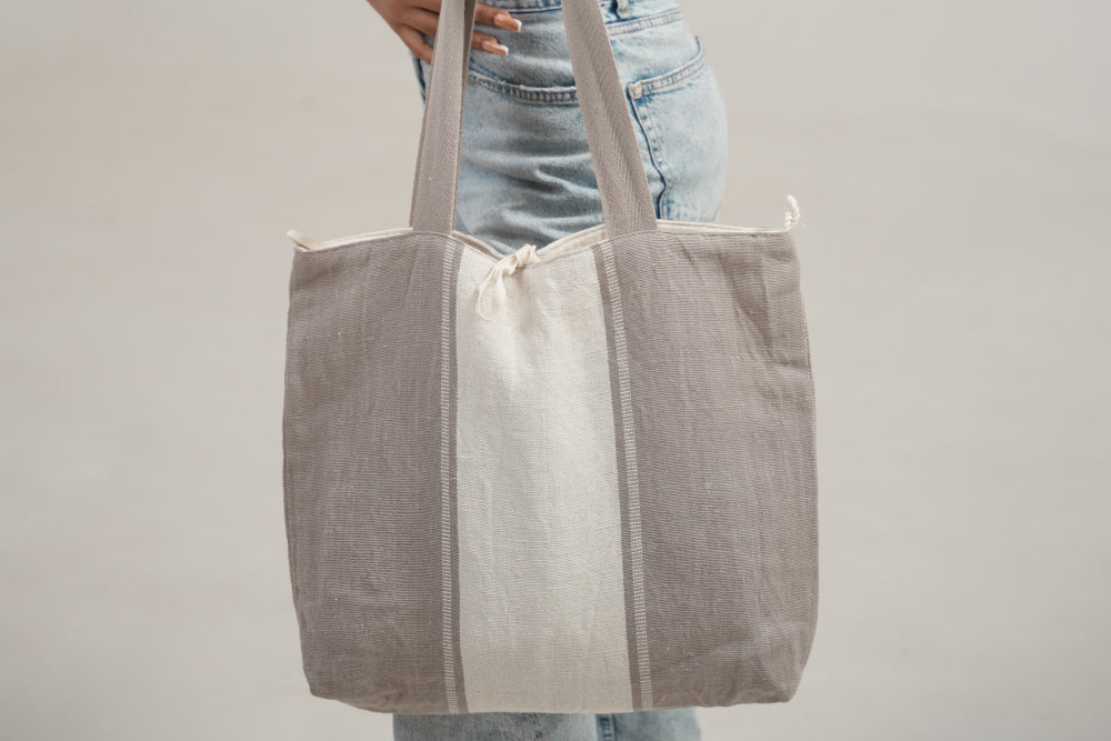 Zihone tote bag held by a model