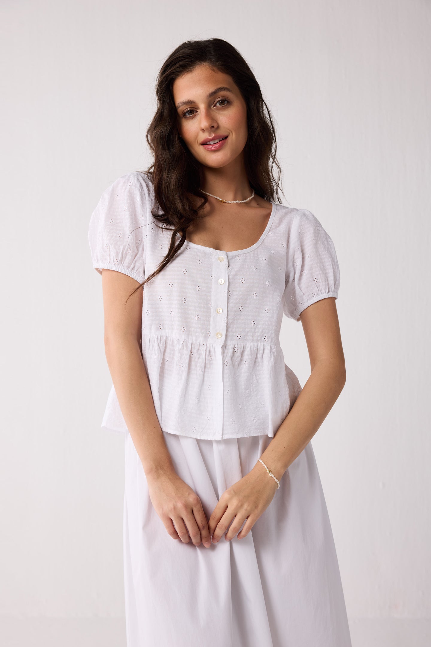 Embroidered Peplum Top with Puff Sleeves in White