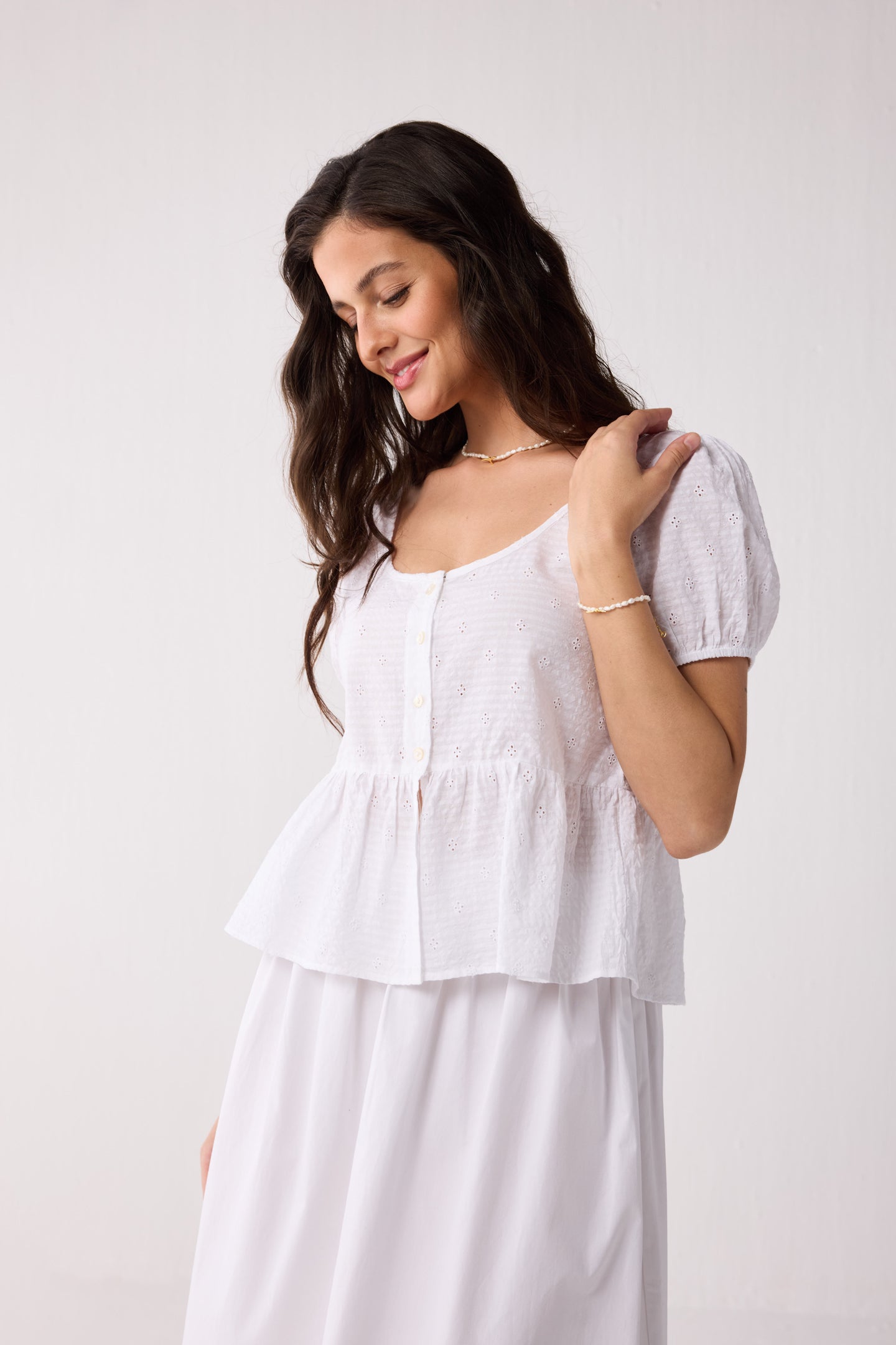 Embroidered Peplum Top with Puff Sleeves in White