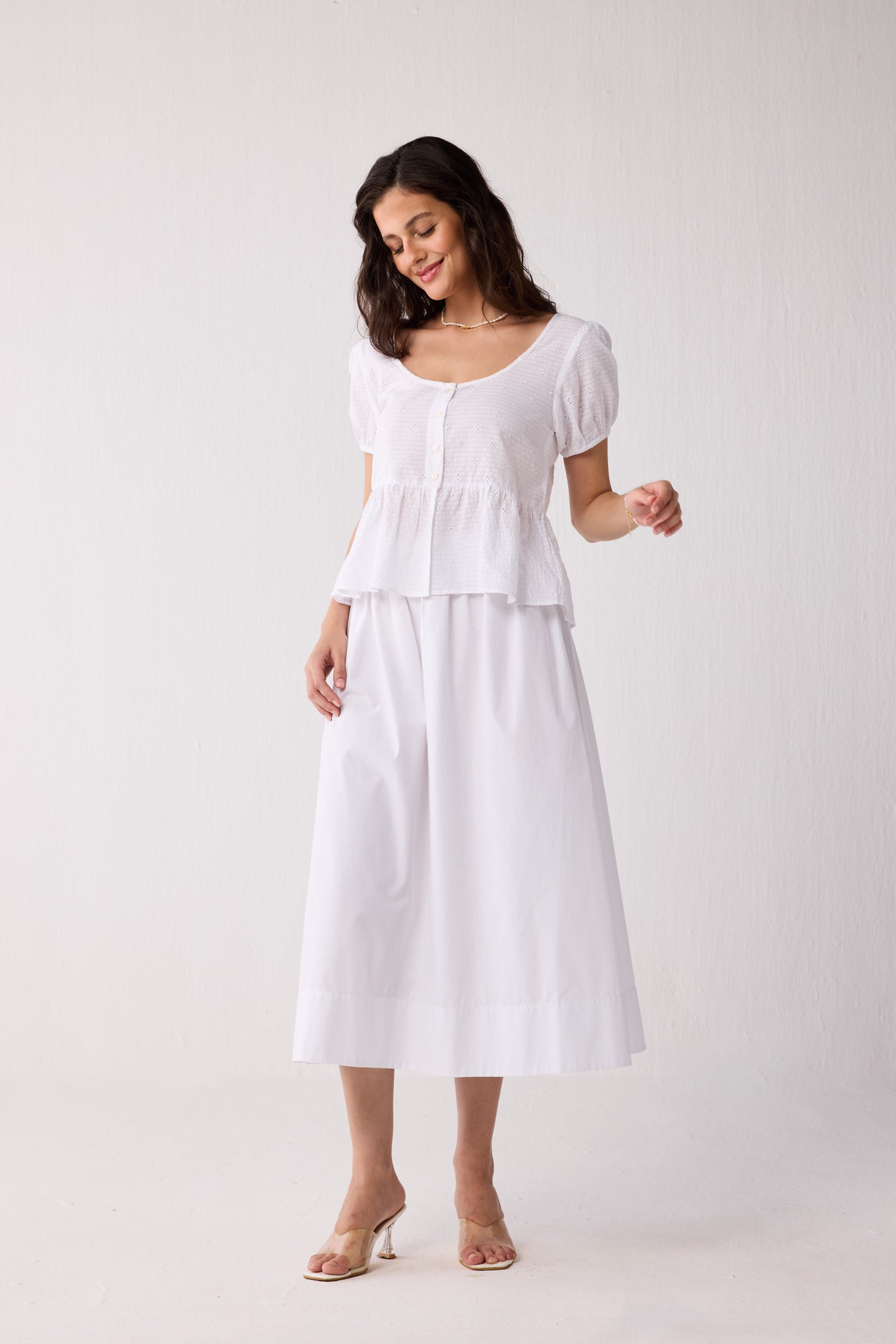 Embroidered Peplum Top with Puff Sleeves in White