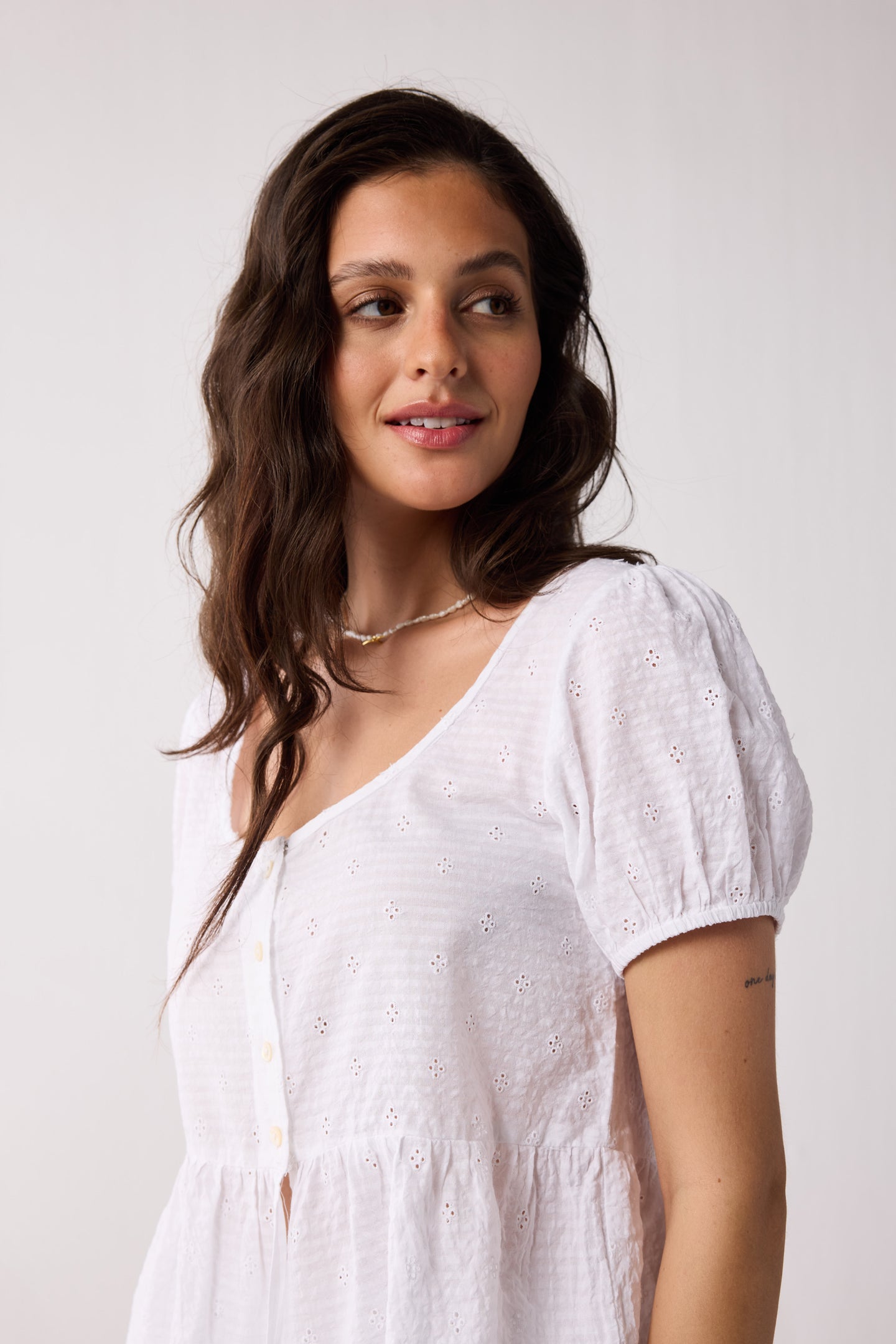 Embroidered Peplum Top with Puff Sleeves in White