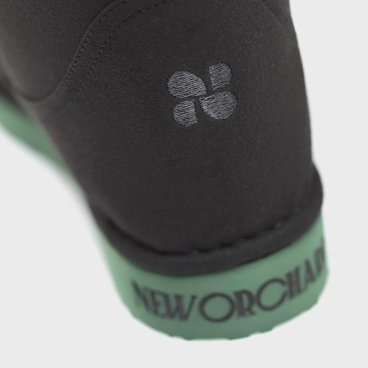 Ethical black winter boots with green sole – vegan style