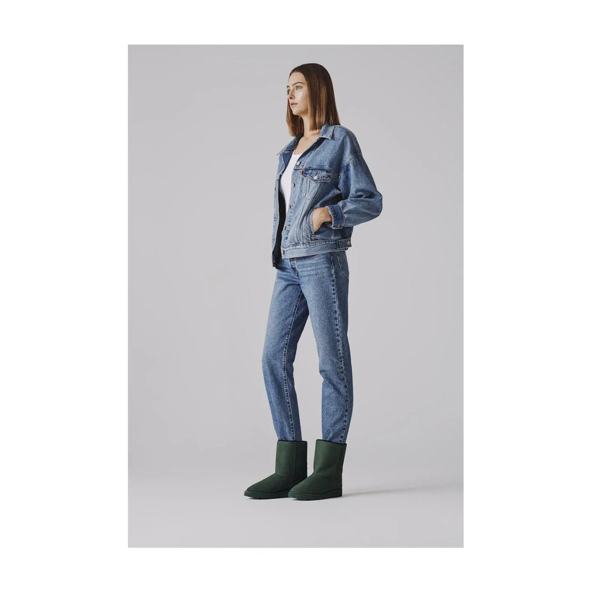 Green vegan cold-weather boots with faux fur