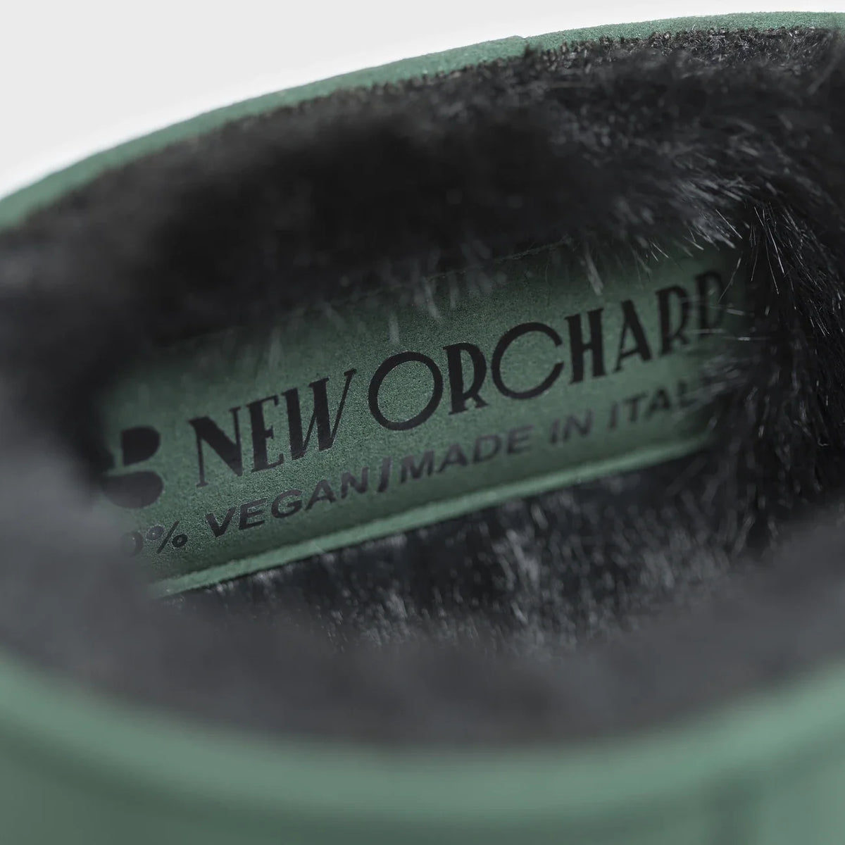 Green vegan mid-calf boots with faux fur