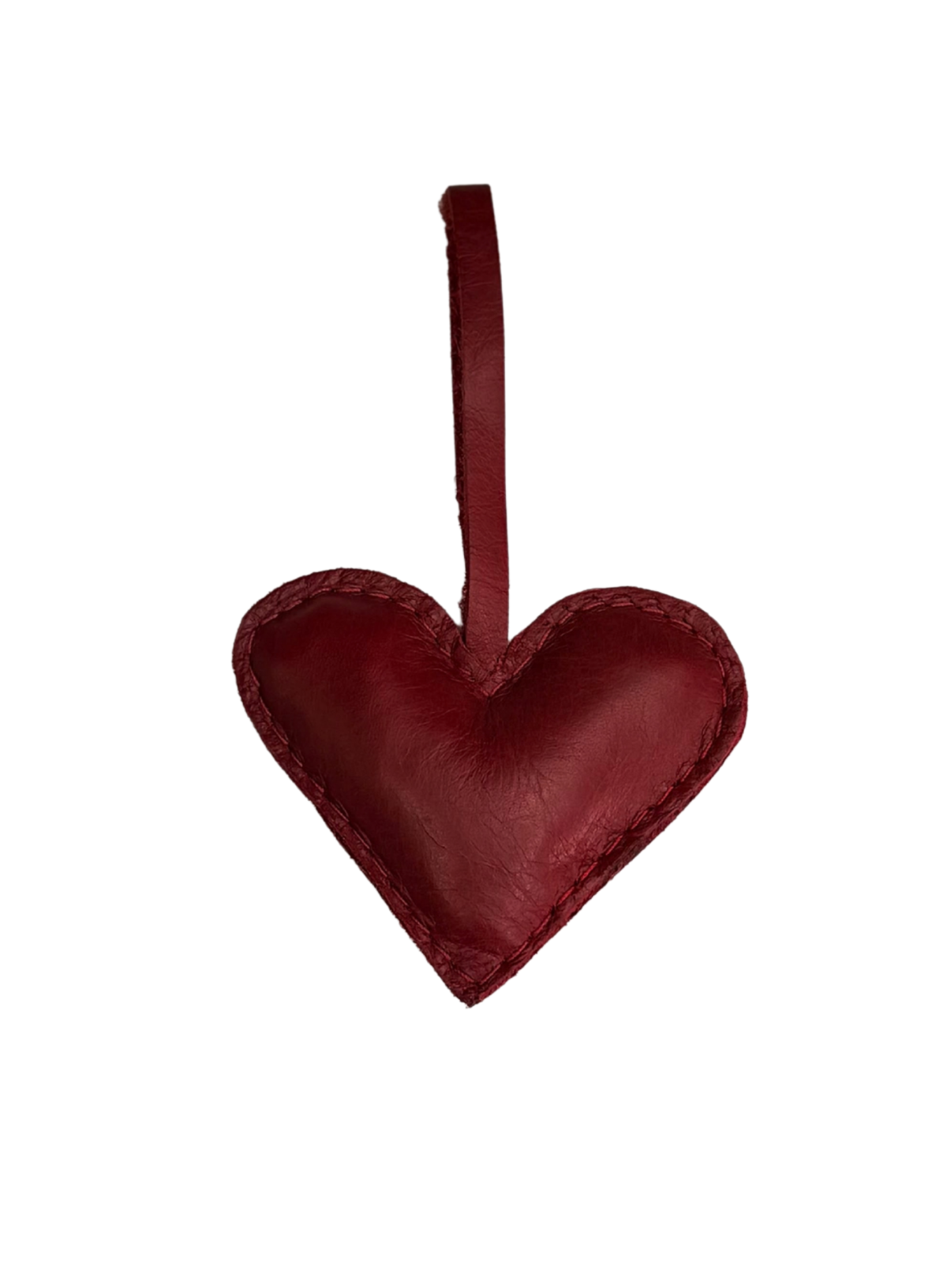 A small heart-shaped leather hanging ornament in a deep burgundy red color, featuring a stitched edge and a matching hanging loop at the top, shown against a plain white background.