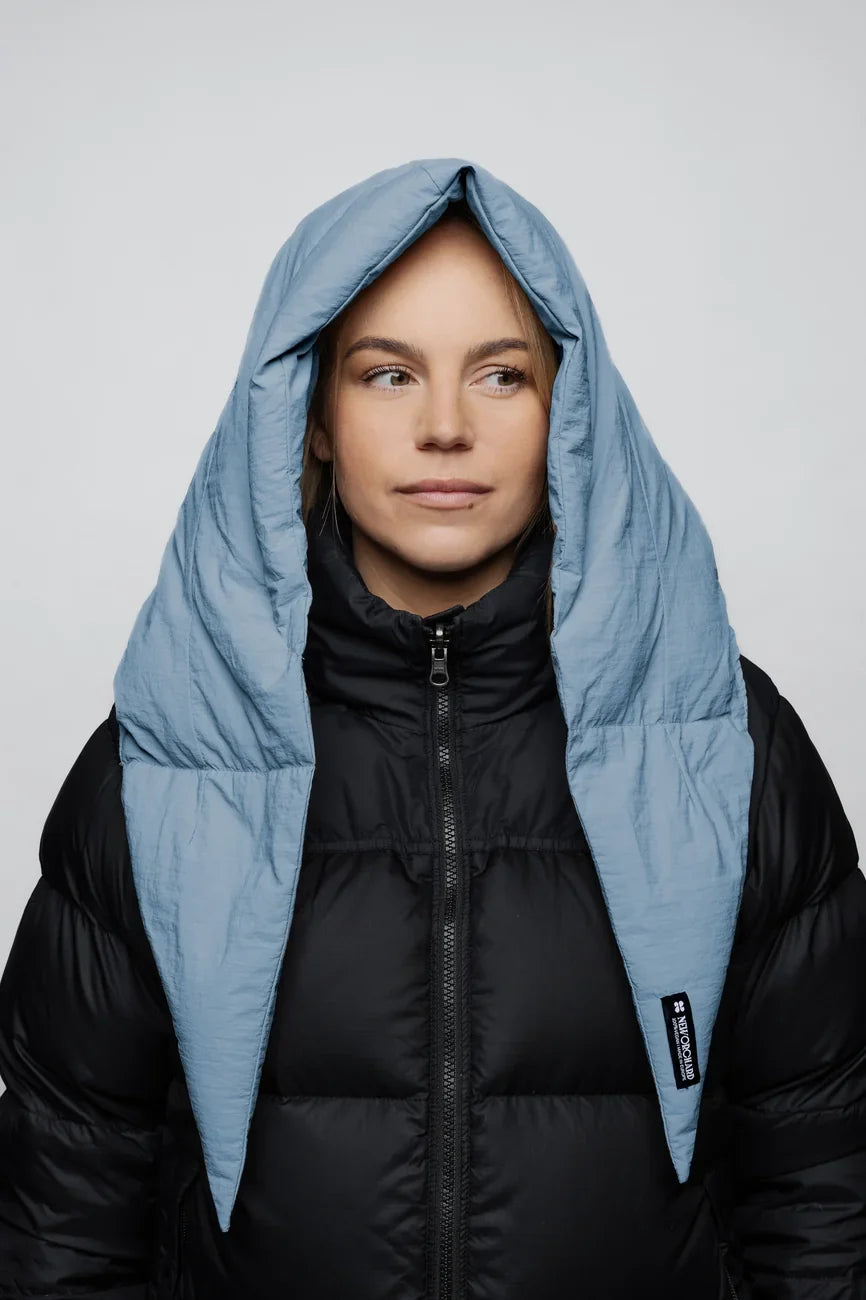 Sky blue vegan winter capuche made from recycled materials with quilted design on black puffer jacket. - The New Orchard - Sky Blue