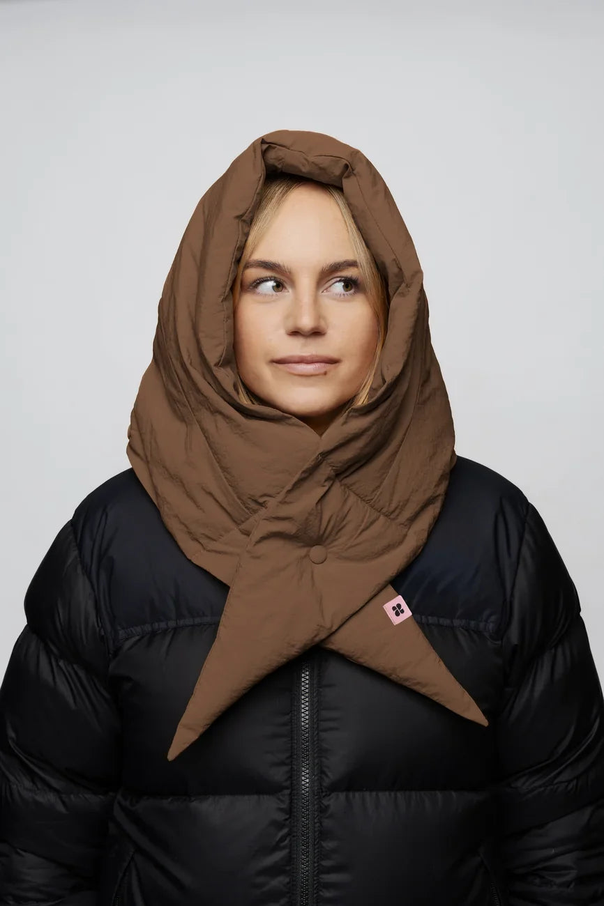 Warm brown vegan winter capuche made from recycled materials, styled over a black puffer jacket. - The New Orchard - Warm Brown