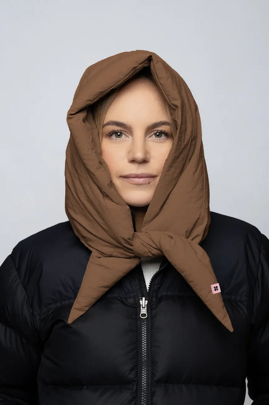 Warm brown vegan winter capuche made from recycled materials, styled over black jacket. - The New Orchard - Warm Brown