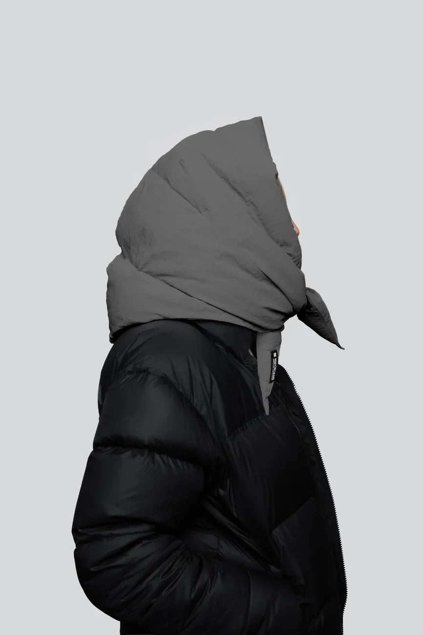 Black puffer jacket with light grey vegan hood made from recycled materials, side view. - The New Orchard - Light Grey