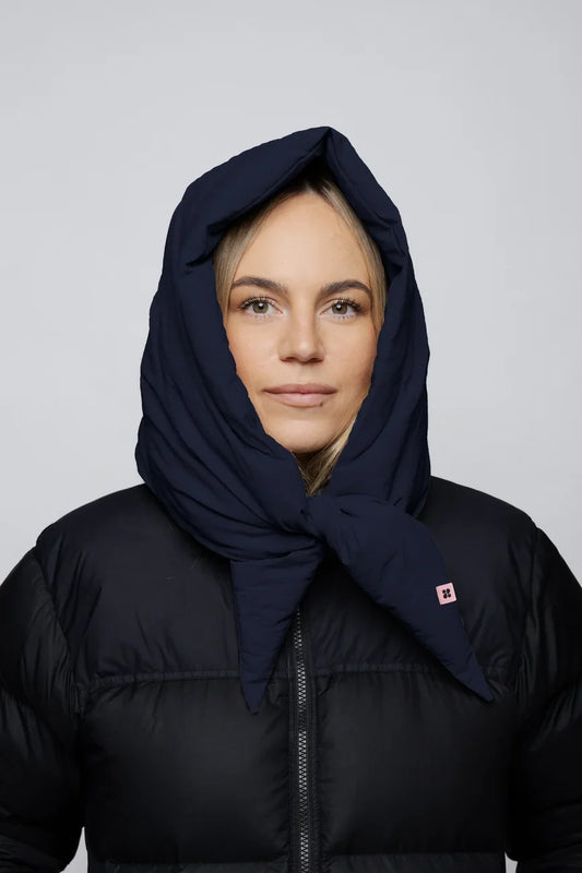 Navy blue vegan winter capuche made from recycled materials, worn over black puffer jacket. - The New Orchard - ⁠Navy Blue