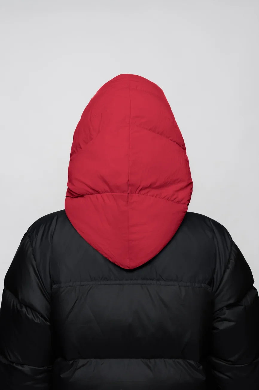 Vivid red vegan hood made from recycled materials on black puffer jacket back view. - The New Orchard - Vivid Red