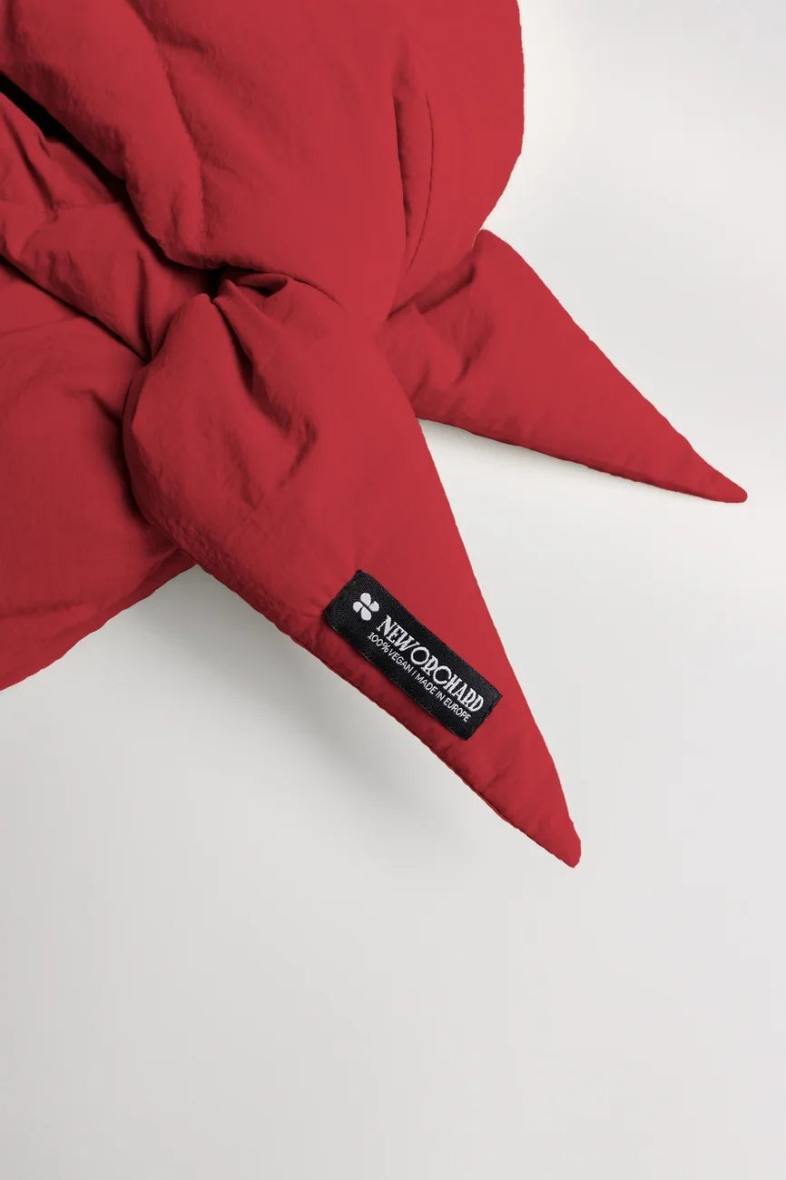 Vivid red vegan hood made from recycled materials with tied ends and black brand label. - The New Orchard - Vivid Red