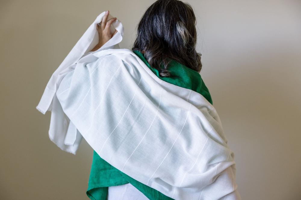 maraki shawl in white with model from behind