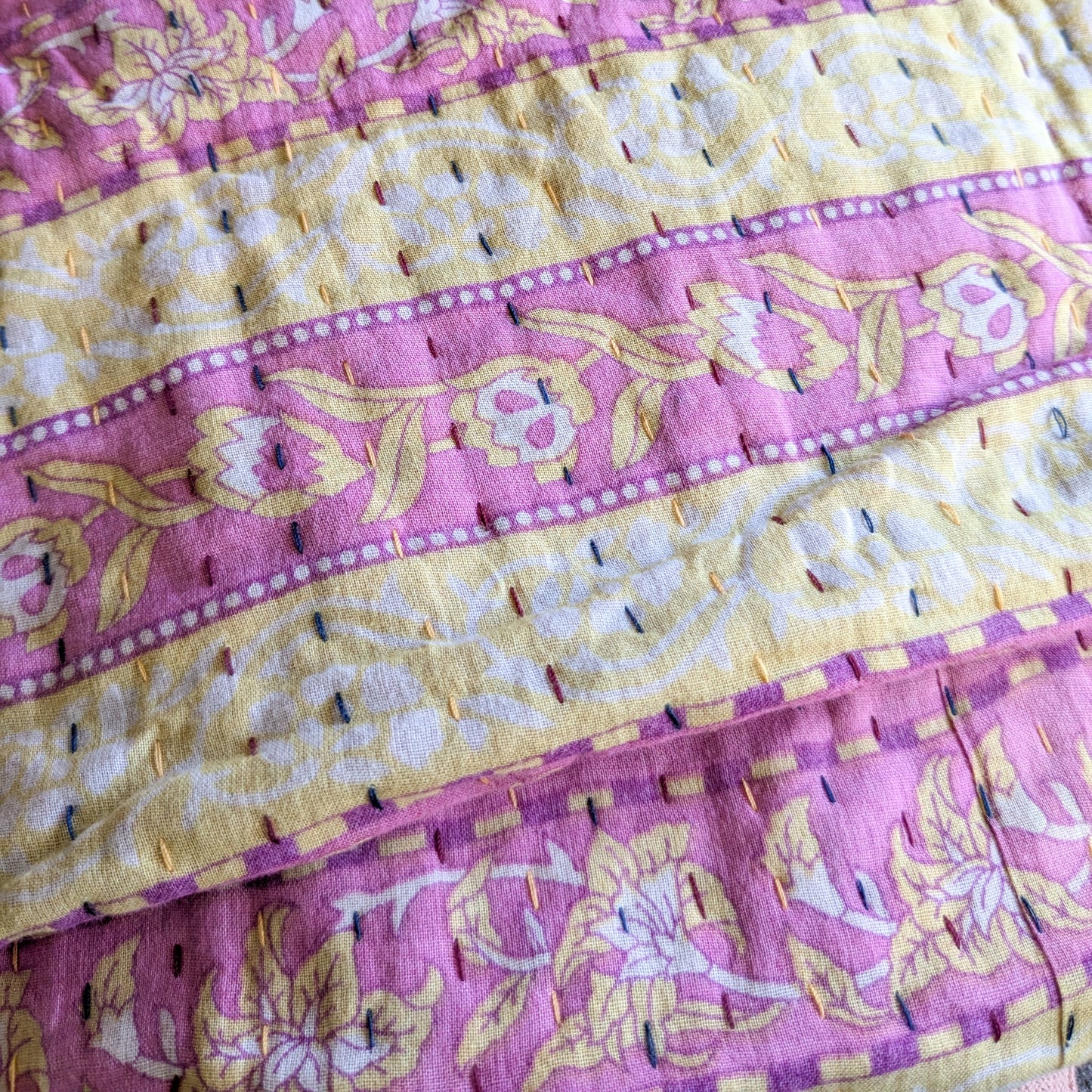 Close-up of pink and yellow patterned fabric