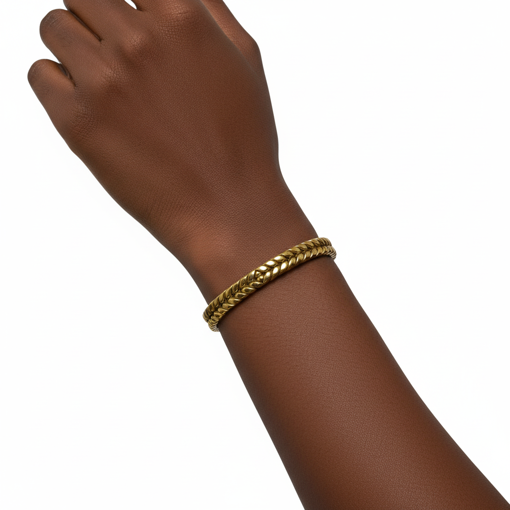 Misa Braided Brass Cuff Bracelet on Black woman's wrist