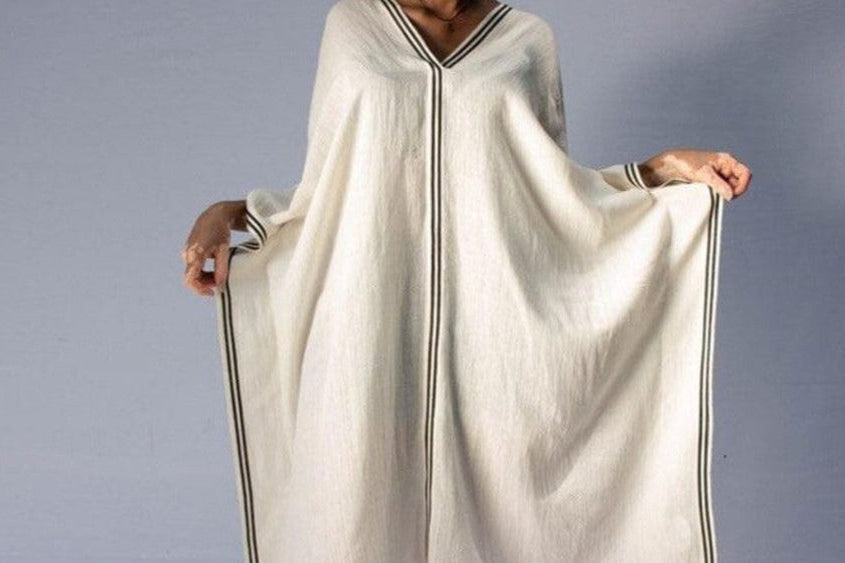 Petra kaftan tunic on female model on grey background 