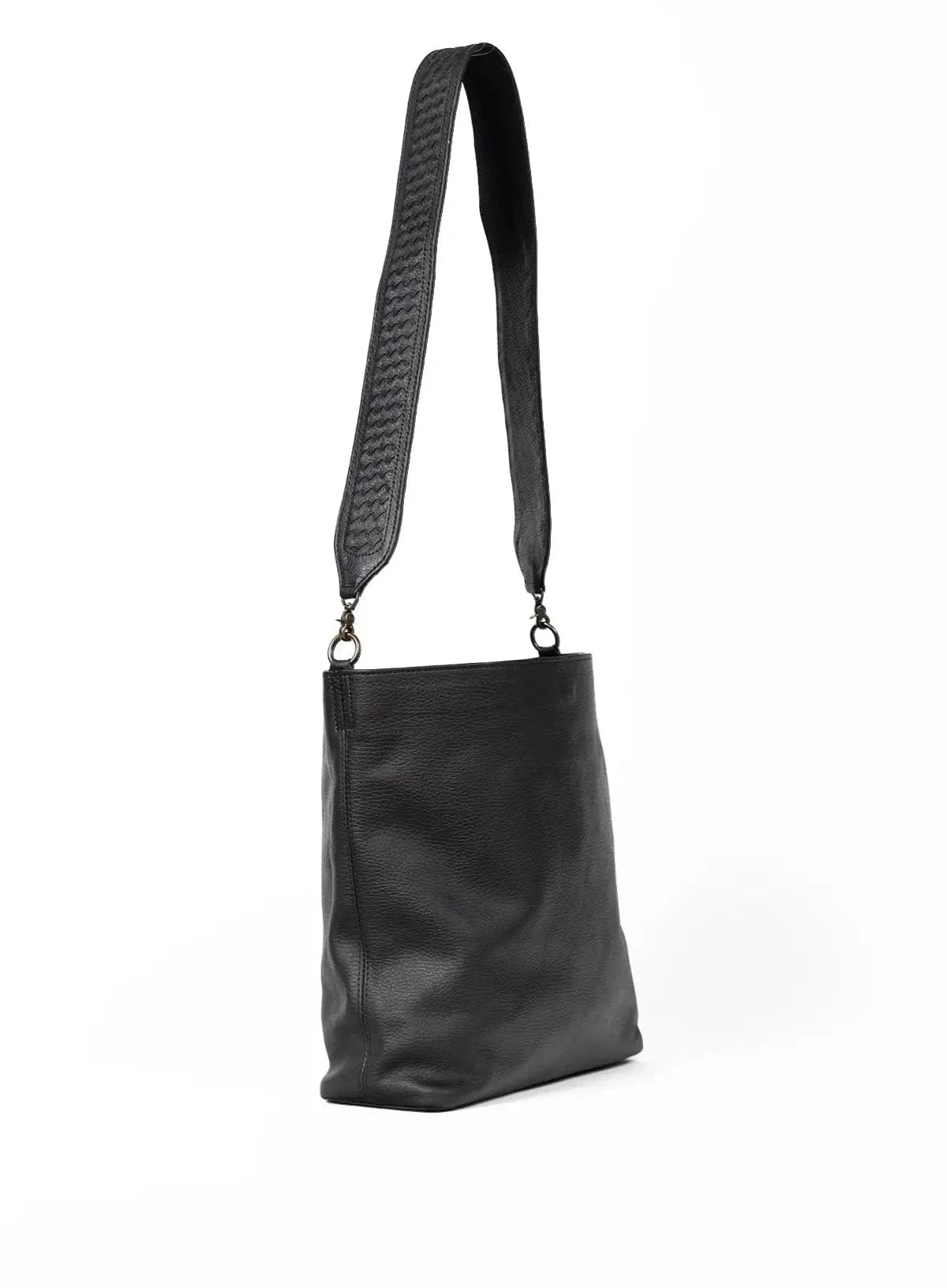 Black leather bag with a strap on a white background