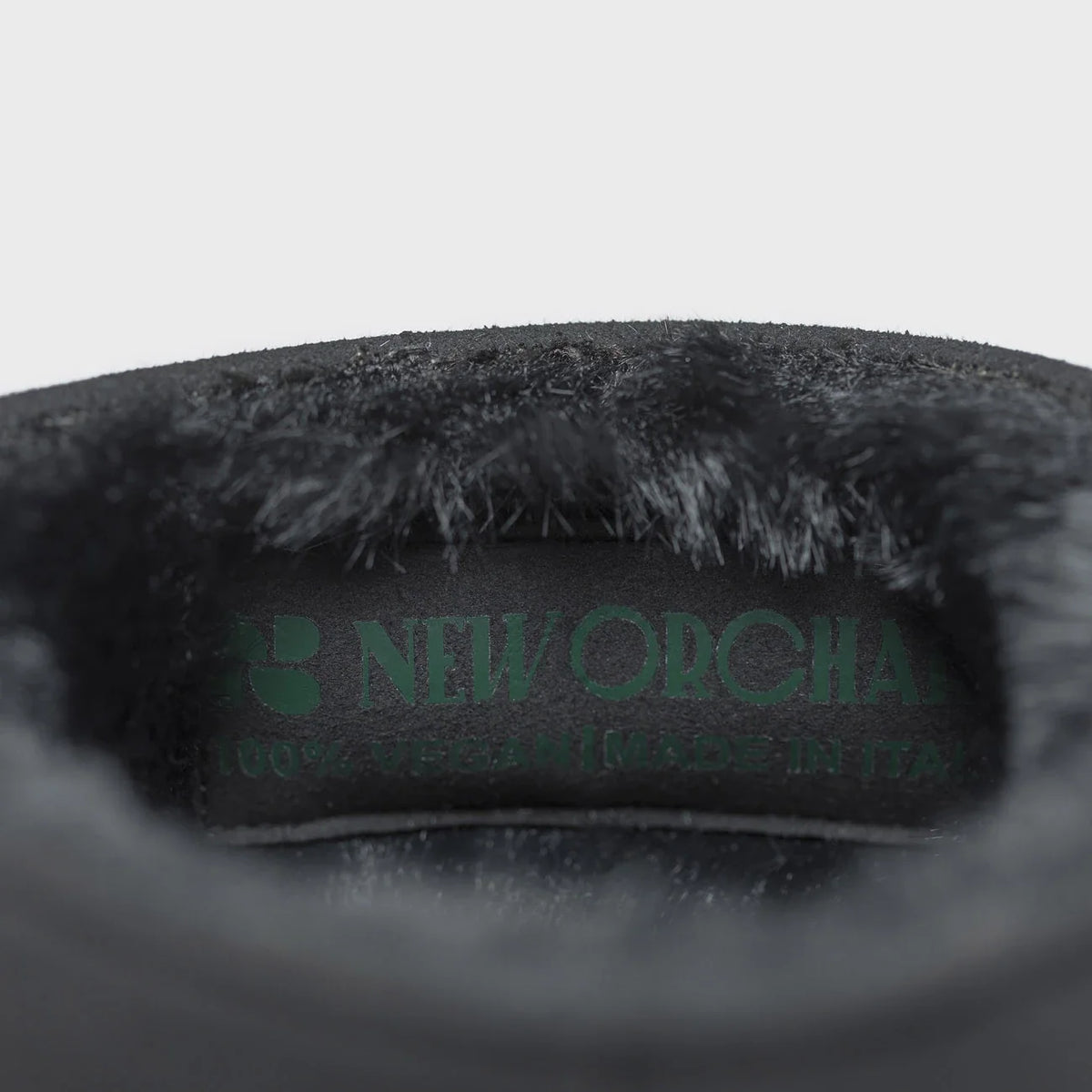 Sustainable black with green sole boots – cruelty-free