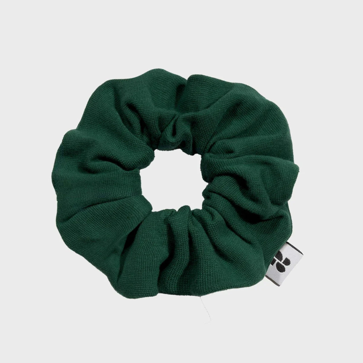 Sustainable green scrunchie made from recycled materials