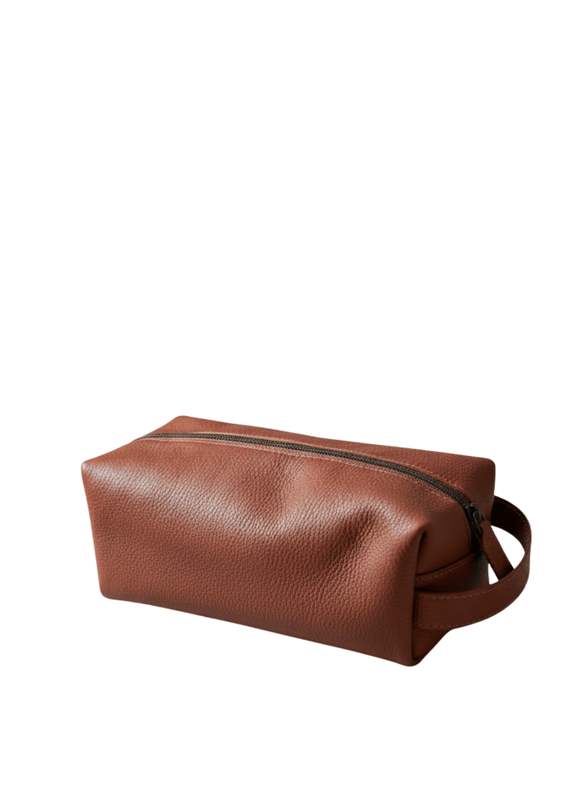 Brown leather dopp kit with a handle on a white background