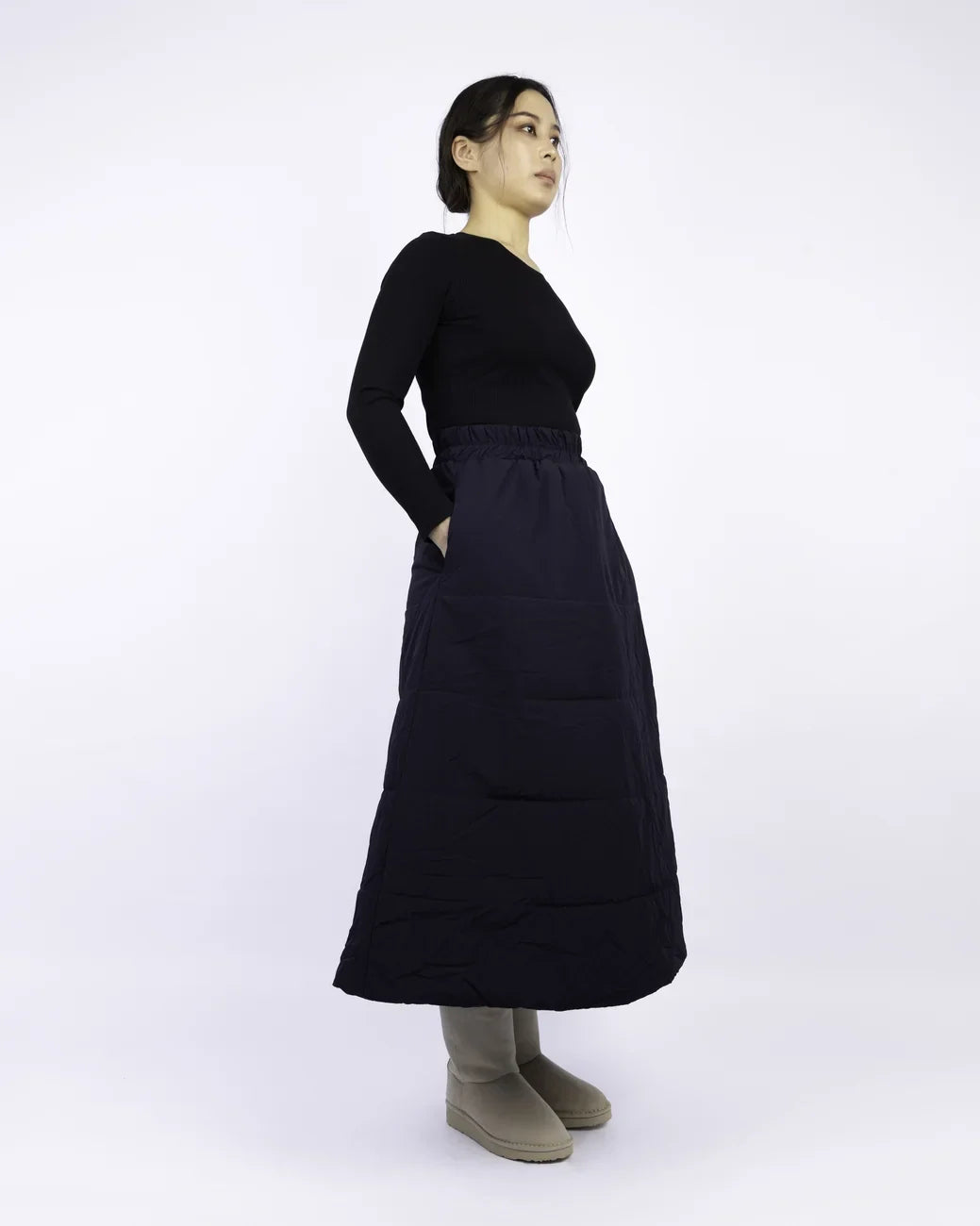 Navy blue vegan winter skirt made from recycled materials, featuring a long A-line silhouette and side pockets. - The New Orchard - Navy Blue / S