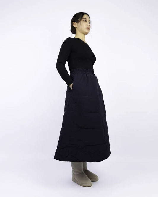 Navy blue vegan winter skirt made from recycled materials, featuring a long A-line silhouette and side pockets. - The New Orchard - Navy Blue / S