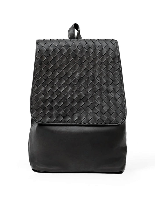 Black woven backpack on a white background